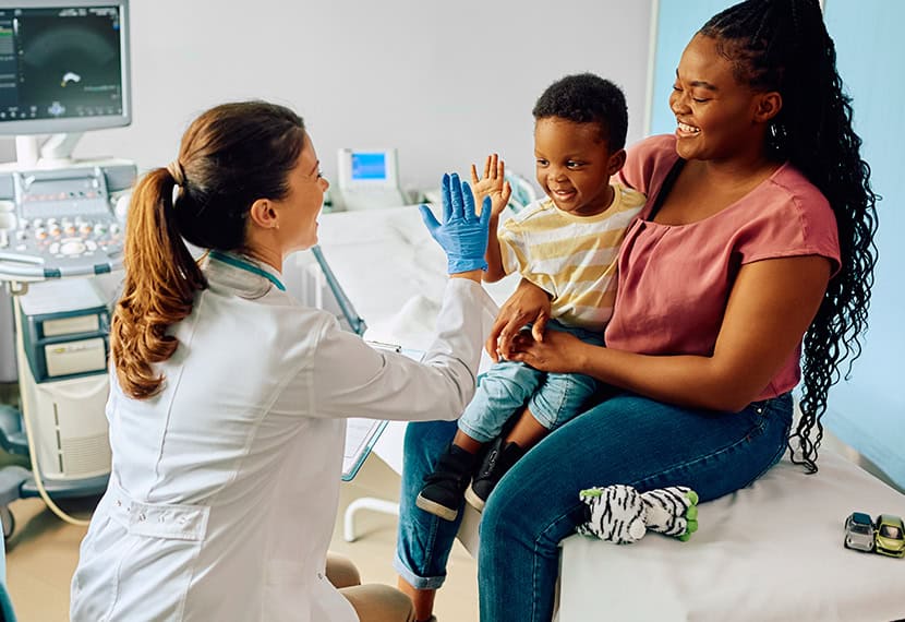 parent and child at doctor